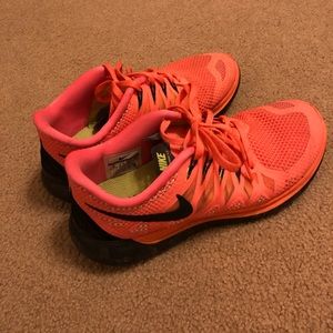 Nike running shoes. Fluorescent orange